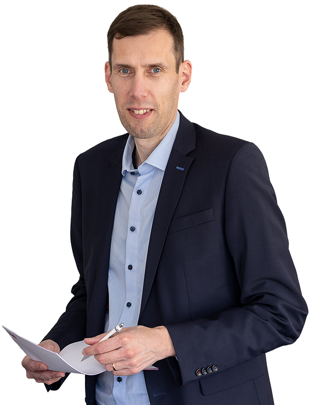 Businessman holding documents in modern office setting